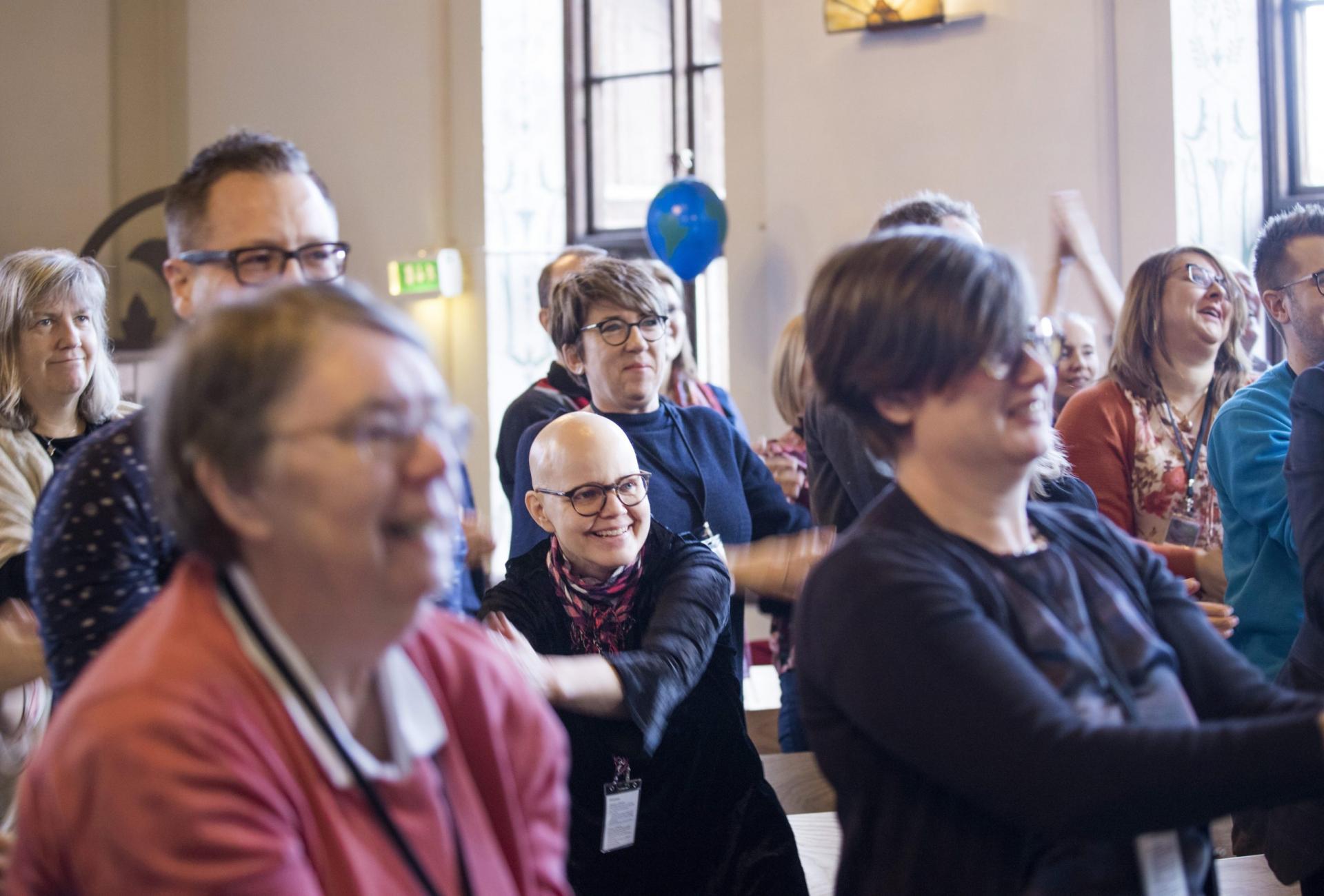 Membership Days 2020. Participants in SMC membership days are engaged in clapping their hands to music.