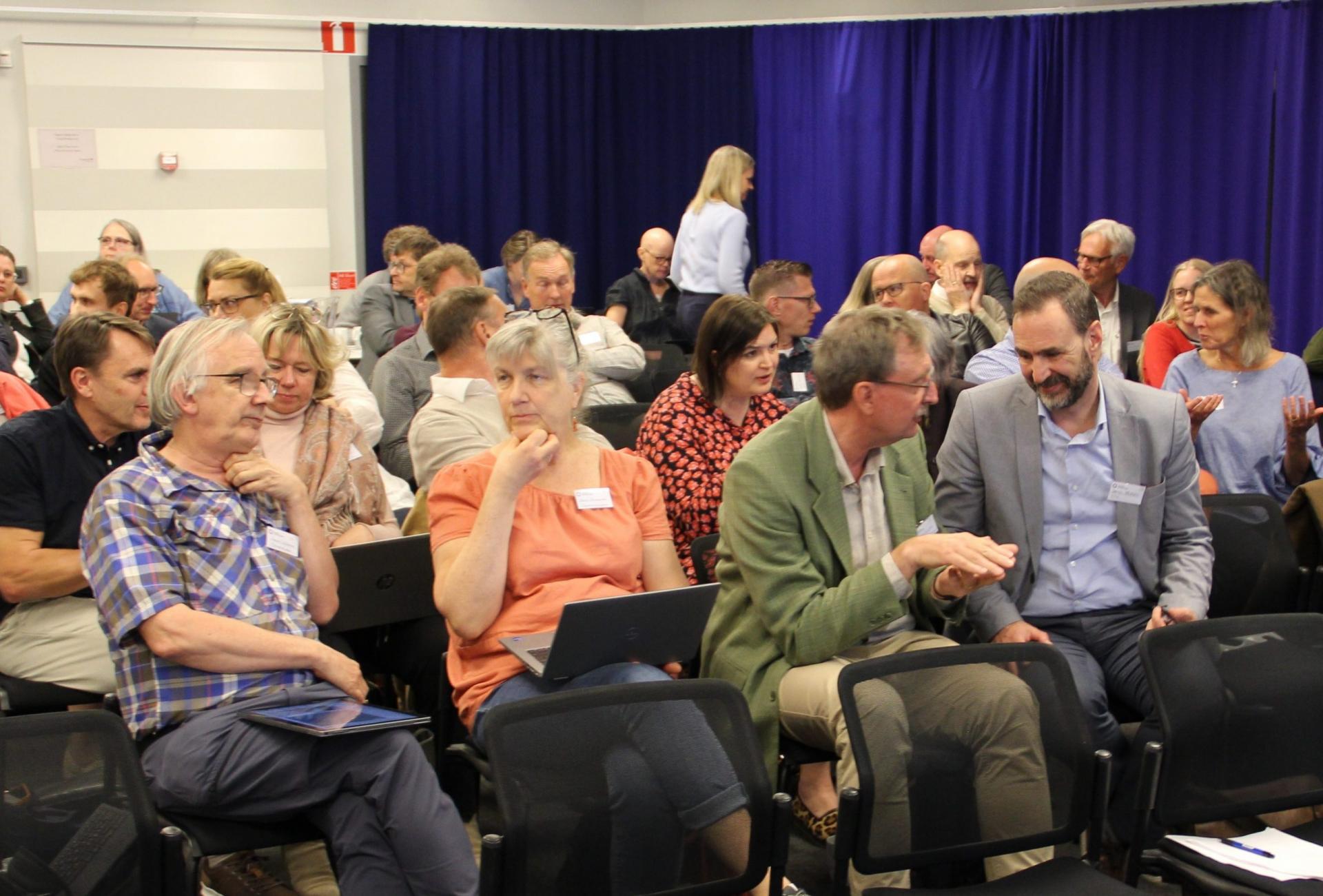 Annual Meeting 2022 when new members of the Board were elected. View of Participants at the Annual Meeting 2022 when sitting down in a conference room.